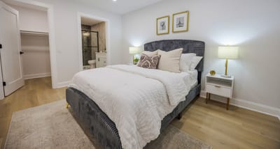 Brightly decorated resident bedroom in a senior living facility