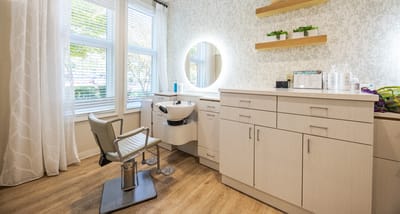 Bright beauty salon area with modern furnishings