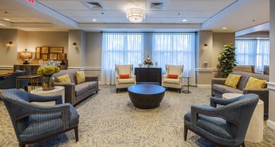 Cozy common area with comfortable seating and natural light