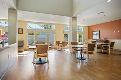 Bright common area with seating and natural light