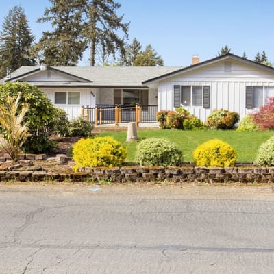 Exterior view of Loving Garden Adult Family Home with gardens