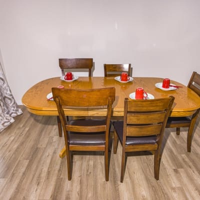 Set dining table with red decor and plates