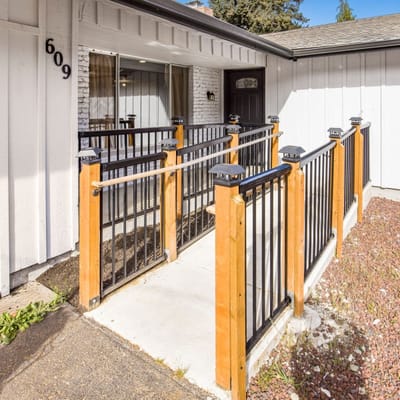 Accessible entryway with railings for residents