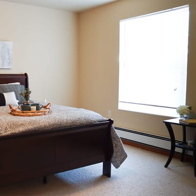 Cozy private resident room with bed and window