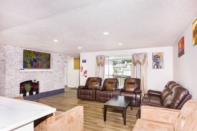 Cozy common area with comfortable seating and a TV
