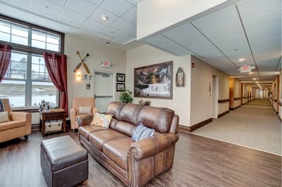 Cozy common area with seating and winter view outside