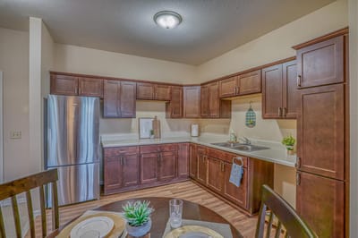 A kitchen area in a resident apartment