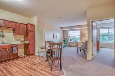 A cozy living space in a senior living apartment