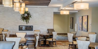 Common area with tables and seating in a modern design