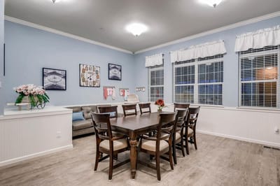 Interior dining area with seating and decor