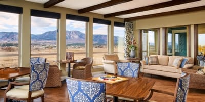 Bright interior common area with mountain views