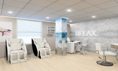 Interior view of a relaxation space with massage chairs