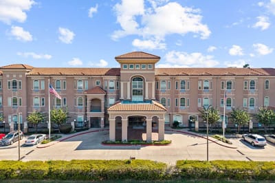 Exterior view of The Hampton at Meadows Place building
