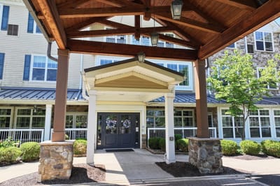 Entrance of The Solana Doylestown facility with covered porch
