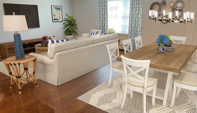 Bright and inviting common area with seating and dining space