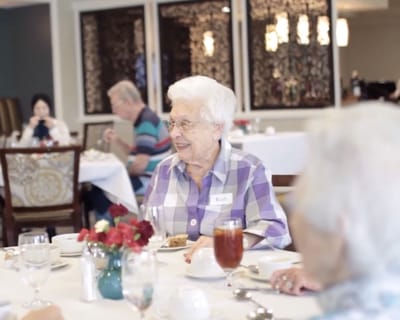 Residents dining in a cheerful dining area