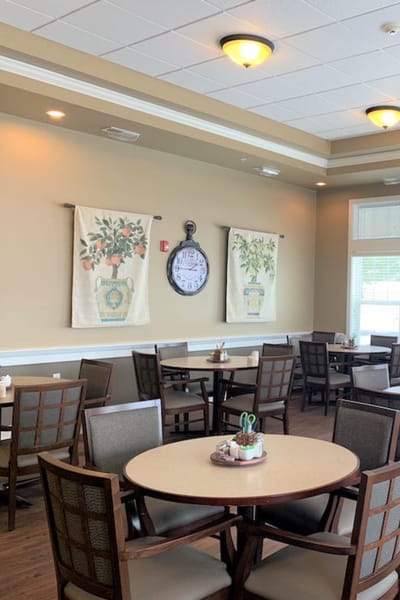 Interior view of a dining room with tables and decor