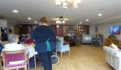 Residents enjoying a meal in a common area