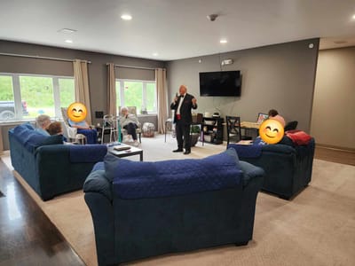 Residents participating in a group activity in a common area