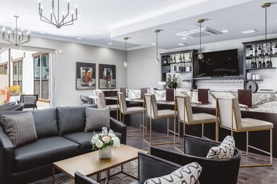 Stylish lounge area with seating and bar