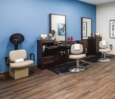 Interior view of a hair salon with styling chairs