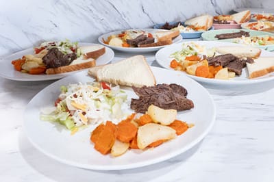 Plates of food served in a dining area