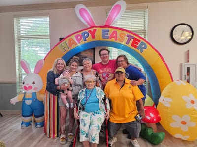 Residents and staff celebrating Easter in a common area