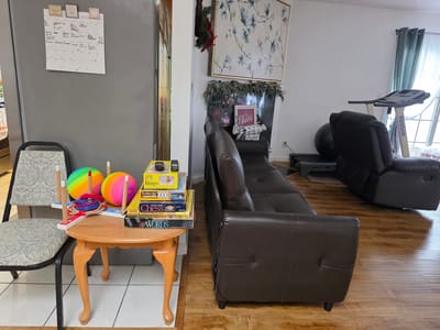 Cozy common area with furniture and games