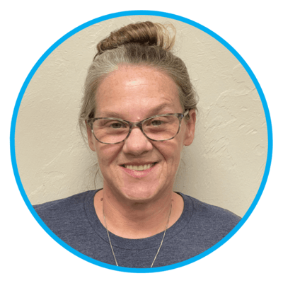 Staff member smiling for a photo