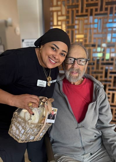 Staff member with resident in a common area