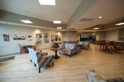 Bright common area with seating and decor