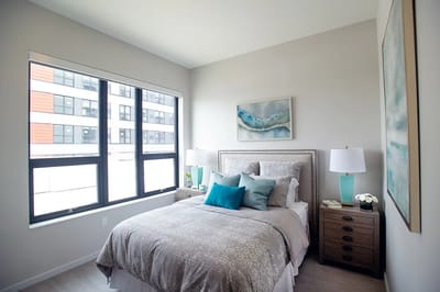 Brightly lit bedroom in a senior living facility