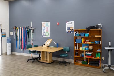 Activity area with equipment arranged on the walls