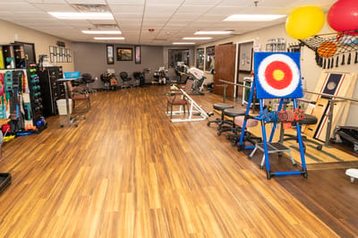 Rehabilitation therapy room with exercise equipment