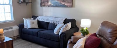 Cozy living room with seating and artwork