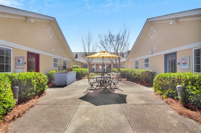 Outdoor courtyard with seating and umbrellas