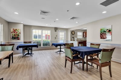 Bright dining area with tables and natural light