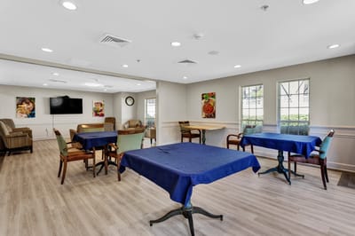 Dining area with tables and chairs set up