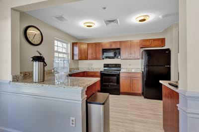 A well-equipped kitchen in a senior living facility