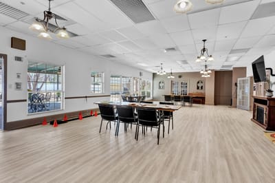 Bright interior of a common area with tables and chairs