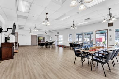 Bright common area with tables and chairs