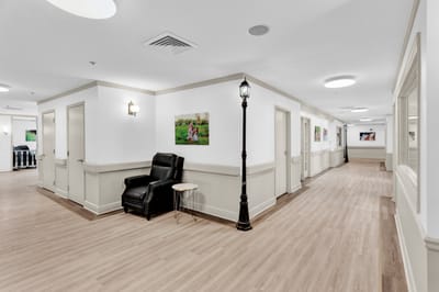 Interior hallway with seating and wall decorations