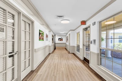 Bright and inviting hallway with decor in a facility