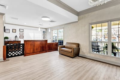 Bright lobby area with reception desk and seating