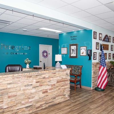 Front desk of Peregrine Senior Living with decor
