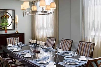 Dining room set with elegant decor and table settings
