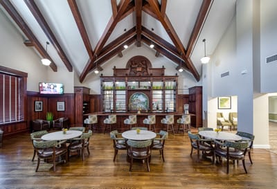 Interior view of a common area with dining tables