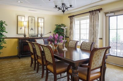 Dining room with a large table and elegant decor