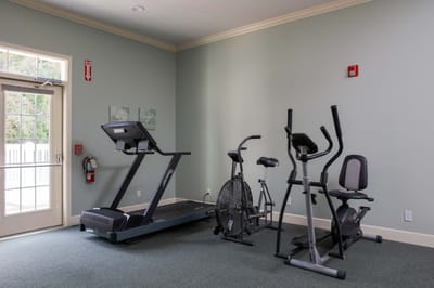 Interior view of a fitness room with exercise equipment