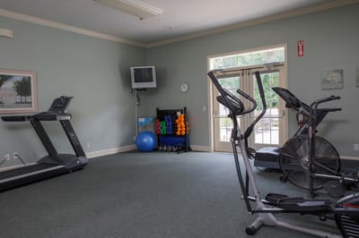 Interior view of a fitness room with exercise equipment